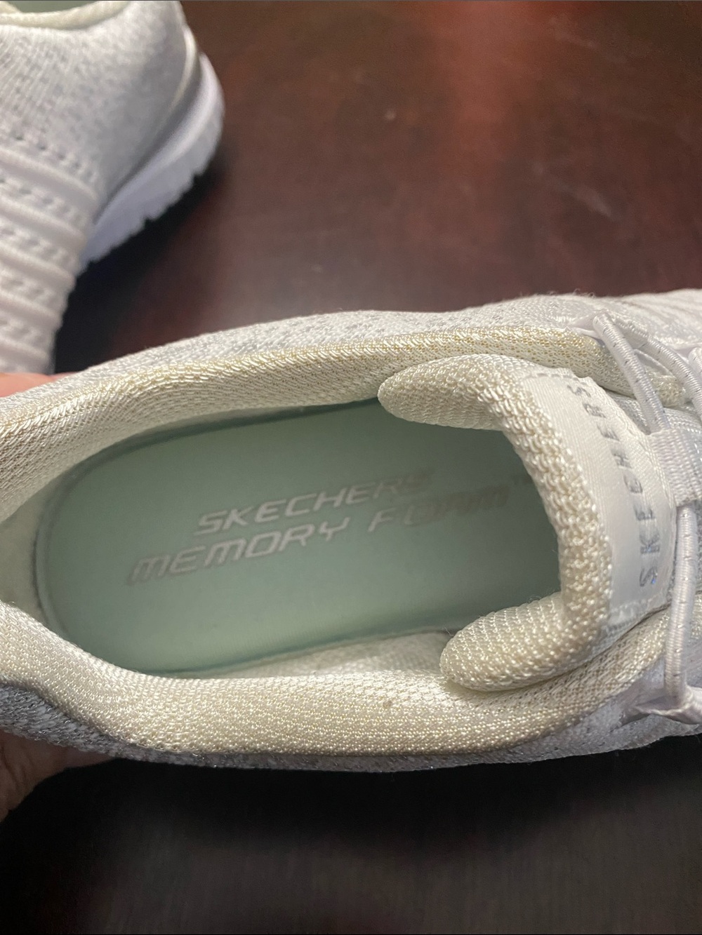 Skechers Women's All-White Slip-On Knit Athletic Sneakers - Picture 5 of 6